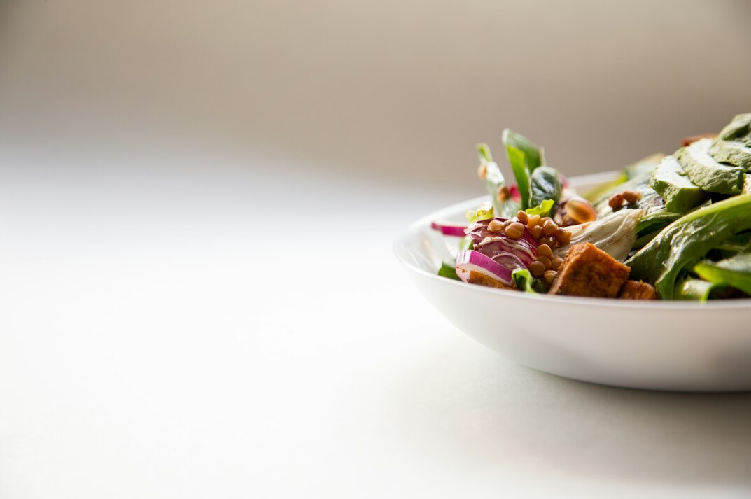 Bowl of fresh colorful salad with vegetables